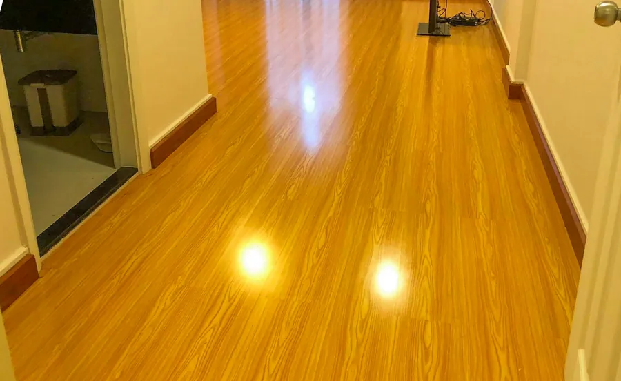 A room with newly laid wood parquet flooring